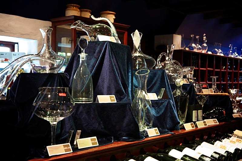 Display of decanters, wine glasses and accessories in Champany Cellars.